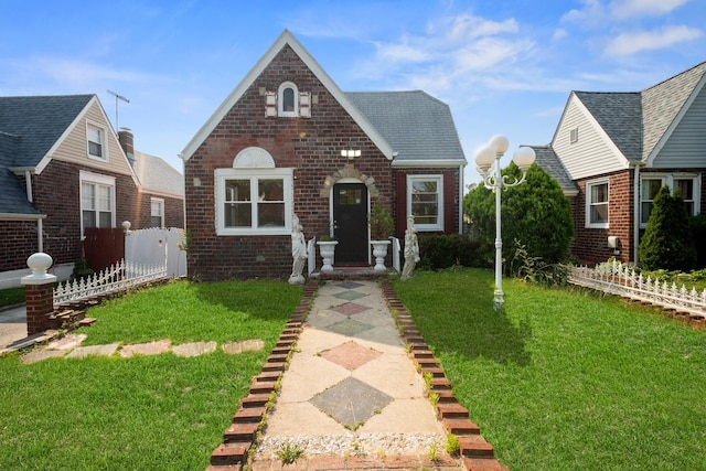 131-36 Francis Lewis Blvd, Laurelton, NY 11413 - tudor-style house with brick siding