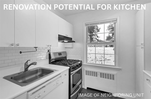 182 Pinewood Rd Unit 28, Hartsdale, NY 10530 - kitchen with stainless steel gas stove, radiator heating unit, under cabinet range hood, light countertops, and dishwasher