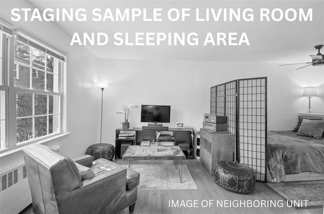 182 Pinewood Rd Unit 28, Hartsdale, NY 10530 - bedroom with wood finished floors and multiple windows