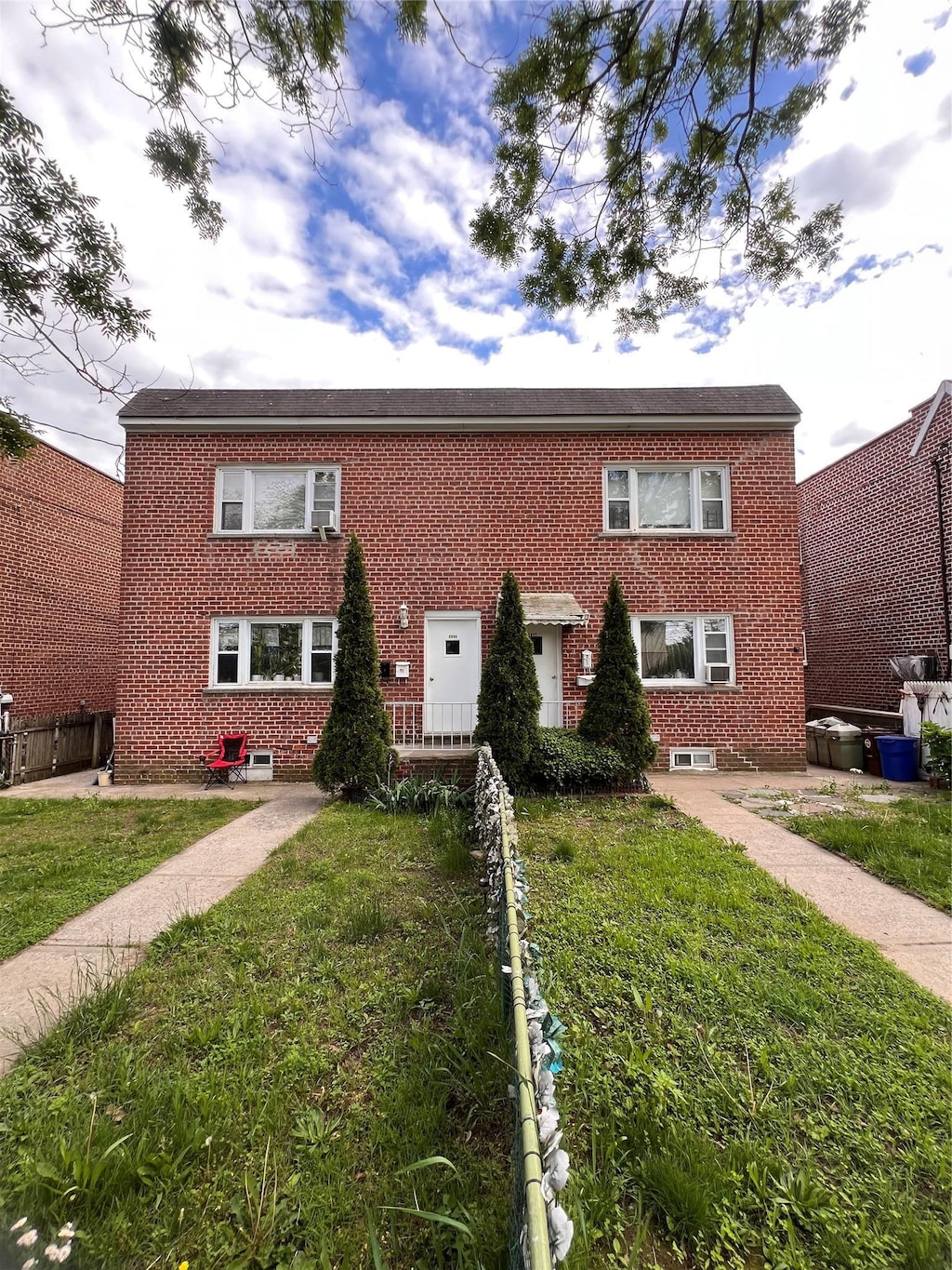 2832 Harding Ave, Bronx, NY 10465 - view of front of home featuring brick siding and a front lawn