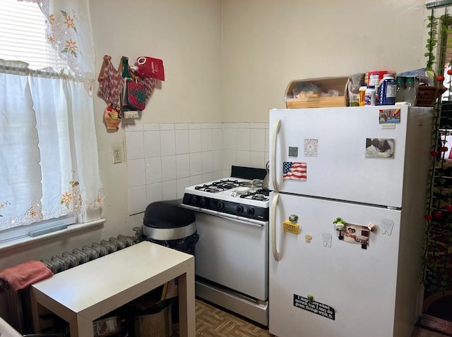14 Matthews Pl, Brooklyn, NY 11236 - kitchen featuring white appliances and tile walls