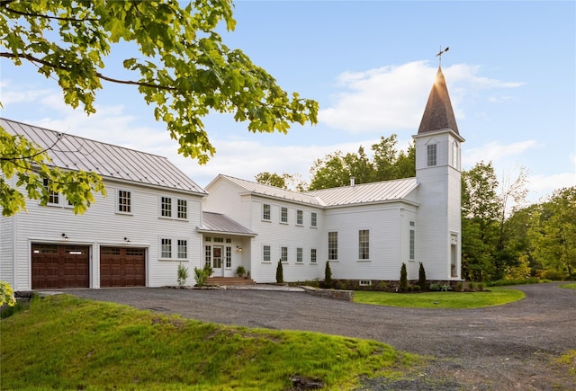 1174 Potter Mountain Rd, Gilboa, NY 12076 - view of front of property with an attached garage, a standing seam roof, asphalt driveway, a front yard, and a metal roof