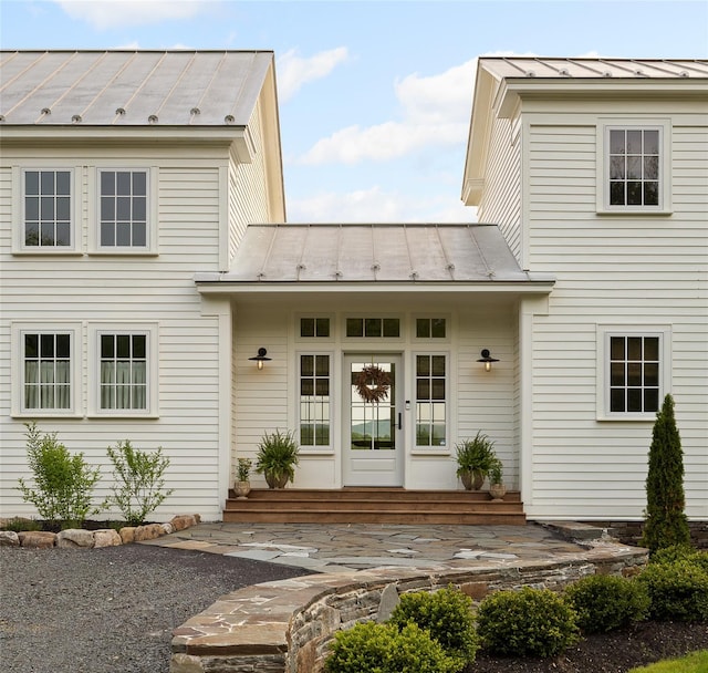 1174 Potter Mountain Rd, Gilboa, NY 12076 - view of exterior entry with a standing seam roof and a metal roof