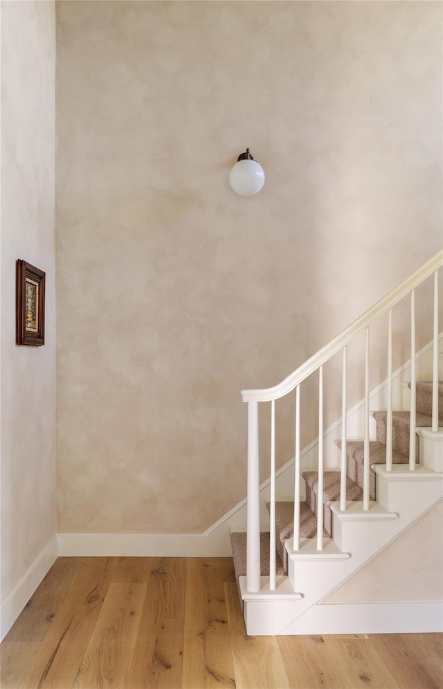 1174 Potter Mountain Rd, Gilboa, NY 12076 - staircase featuring wood finished floors and baseboards