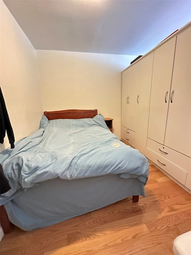 4732 207th St, Bayside, NY 11361 - bedroom featuring light wood-style flooring