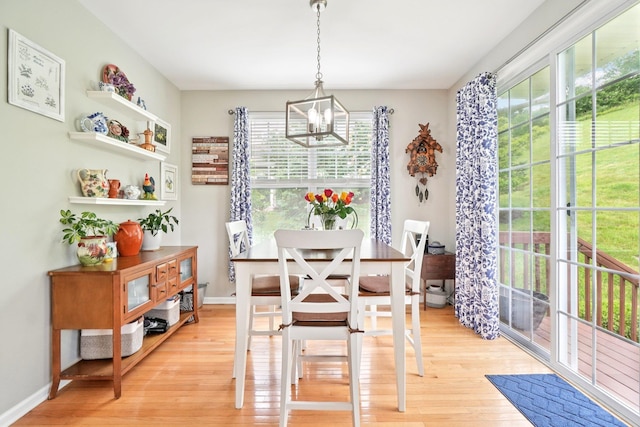 2602 Hawthorn Way, New Windsor, NY 12553 - dining room with a chandelier, light wood-style flooring, and plenty of natural light
