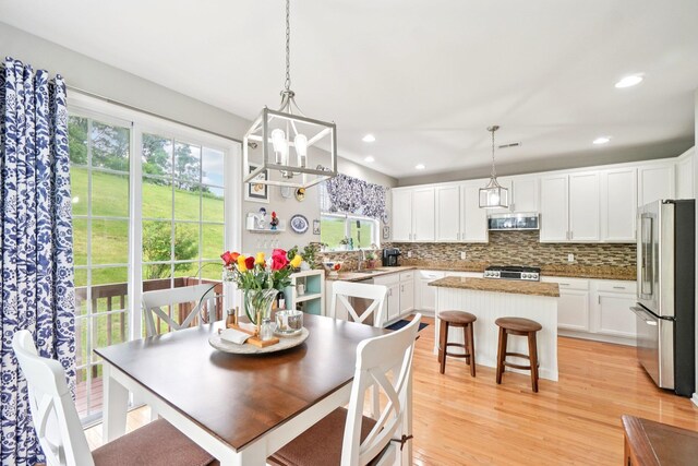 2602 Hawthorn Way, New Windsor, NY 12553 - dining room with light wood-type flooring, recessed lighting, and a chandelier