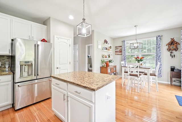 2602 Hawthorn Way, New Windsor, NY 12553 - kitchen featuring high quality fridge, light wood-style floors, white cabinets, decorative light fixtures, and recessed lighting