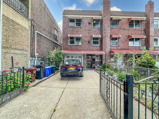 1365 Crosby Ave, Bronx, NY 10461 - view of property with concrete driveway and an attached garage