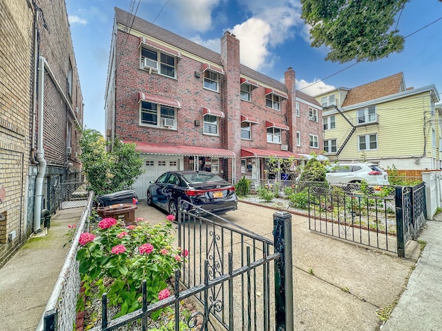 1365 Crosby Ave, Bronx, NY 10461 - view of building exterior with a garage and a residential view