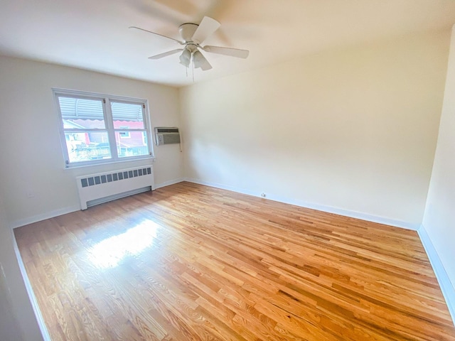 1365 Crosby Ave, Bronx, NY 10461 - unfurnished room with radiator, light wood-style floors, and ceiling fan