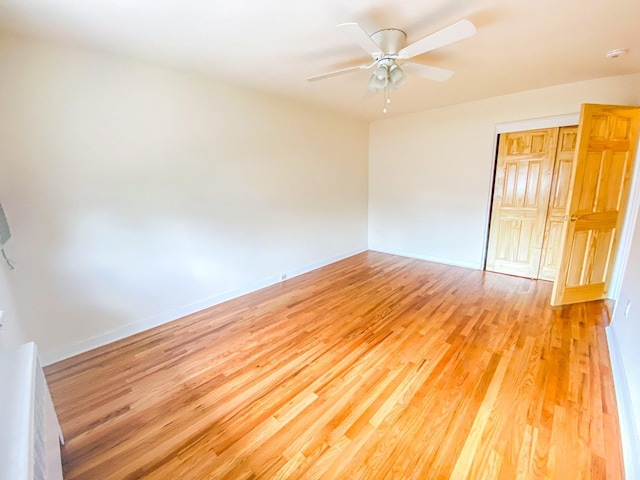1365 Crosby Ave, Bronx, NY 10461 - spare room with light wood-type flooring, ceiling fan, and a smoke detector