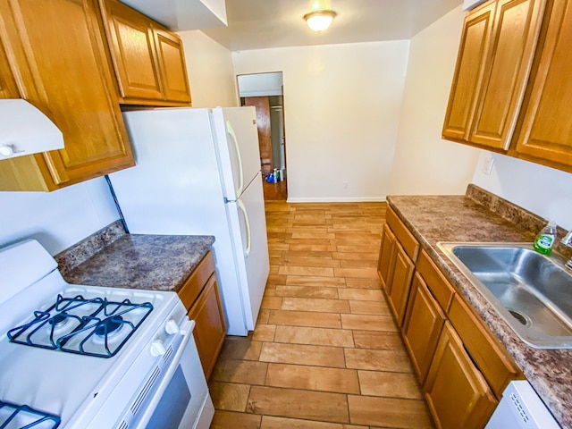 1365 Crosby Ave, Bronx, NY 10461 - kitchen featuring white appliances, brown cabinets, exhaust hood, and dark countertops