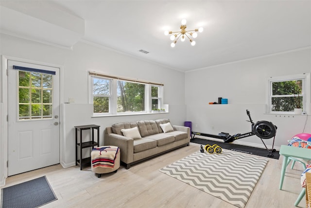 8 Sylvan Ln, Scarsdale, NY 10583 - living room with crown molding, a chandelier, and light wood finished floors