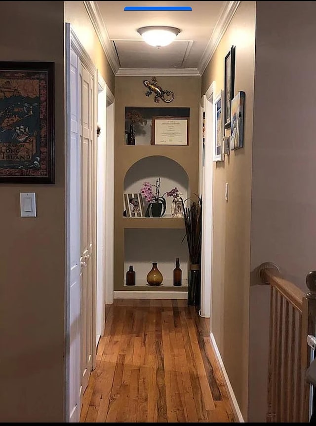 3 Malmac Ct, West Islip, NY 11795 - hallway featuring wood-type flooring and ornamental molding
