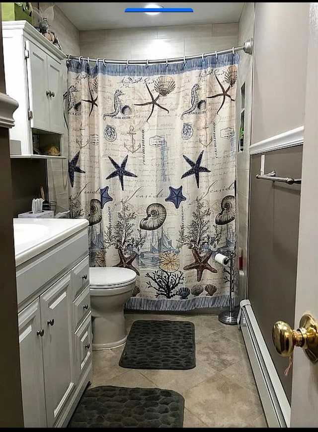 3 Malmac Ct, West Islip, NY 11795 - full bathroom with a baseboard radiator, vanity, curtained shower, and tile patterned floors