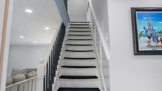 55 Charm City Dr, Port Jefferson Station, NY 11776 - staircase with recessed lighting and crown molding
