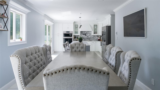 55 Charm City Dr, Port Jefferson Station, NY 11776 - dining space featuring ornamental molding
