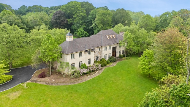 3747 Purchase St, Purchase, NY 10577 - aerial view of property and surrounding area with a heavily wooded area