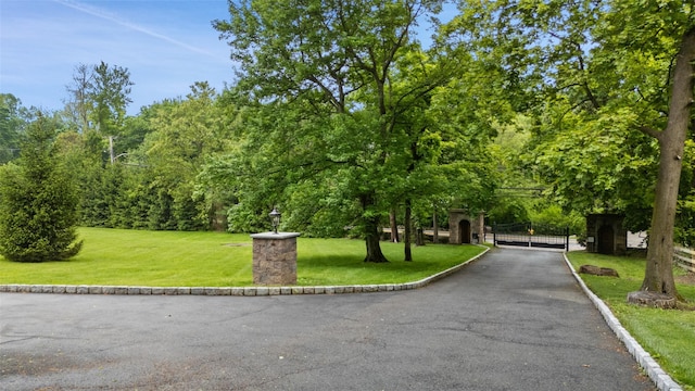 3747 Purchase St, Purchase, NY 10577 - view of community with a gate and a yard