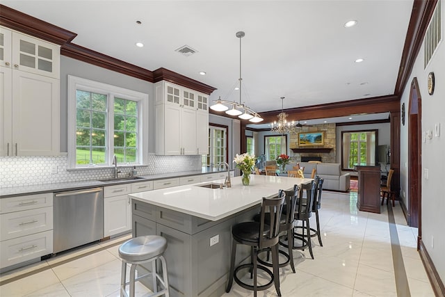 3747 Purchase St, Purchase, NY 10577 - kitchen with dishwasher, crown molding, backsplash, light marble finish floors, and open floor plan