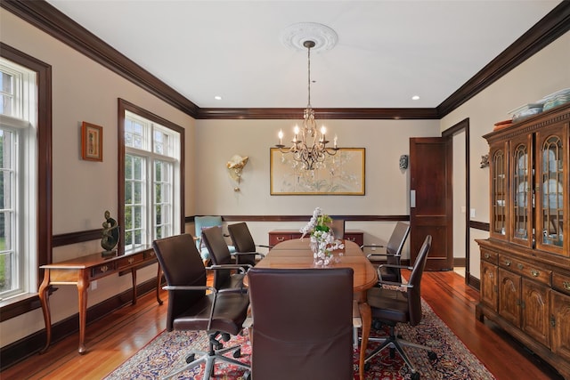 3747 Purchase St, Purchase, NY 10577 - dining area with wood finished floors, a chandelier, and ornamental molding