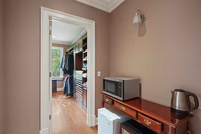 3747 Purchase St, Purchase, NY 10577 - hall with crown molding, light wood-type flooring, and an office area
