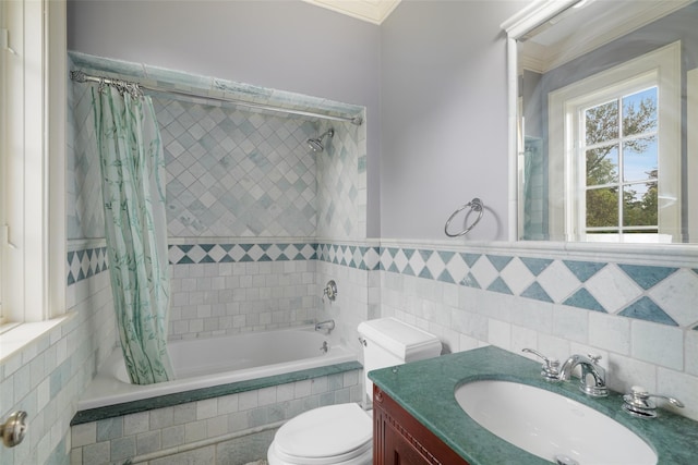 3747 Purchase St, Purchase, NY 10577 - full bathroom featuring tiled shower / bath combo, vanity, tile walls, and crown molding