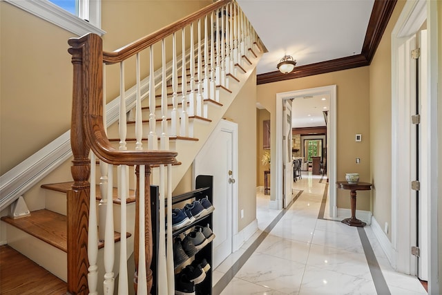 3747 Purchase St, Purchase, NY 10577 - staircase featuring ornamental molding and marble finish flooring