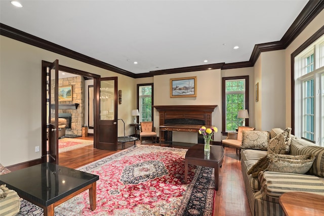 3747 Purchase St, Purchase, NY 10577 - living area featuring a fireplace, hardwood / wood-style floors, plenty of natural light, ornamental molding, and recessed lighting