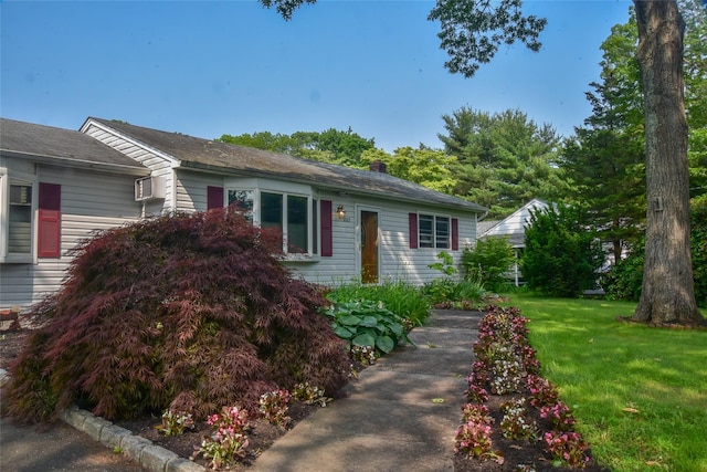 805 Canal Rd, Mount Sinai, NY 11766 - view of front of house featuring a chimney and a front yard