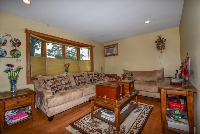 805 Canal Rd, Mount Sinai, NY 11766 - living area featuring wood finished floors, a wall unit AC, and recessed lighting