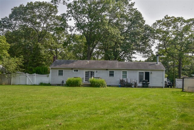 805 Canal Rd, Mount Sinai, NY 11766 - rear view of property with a gate and french doors
