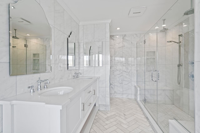 8 Pippin Ln, Lloyd Harbor, NY 11743 - bathroom featuring a shower stall, double vanity, recessed lighting, tile walls, and crown molding