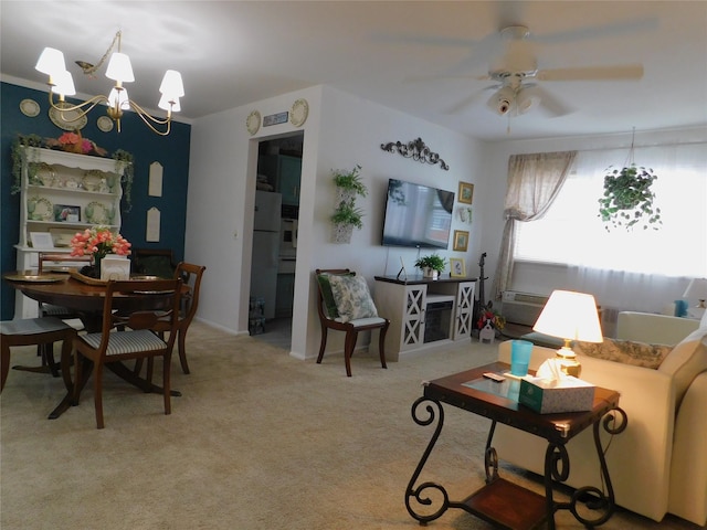 1879 Crompond Rd Unit # D15, Peekskill, NY 10566 - carpeted dining area featuring a chandelier and a ceiling fan