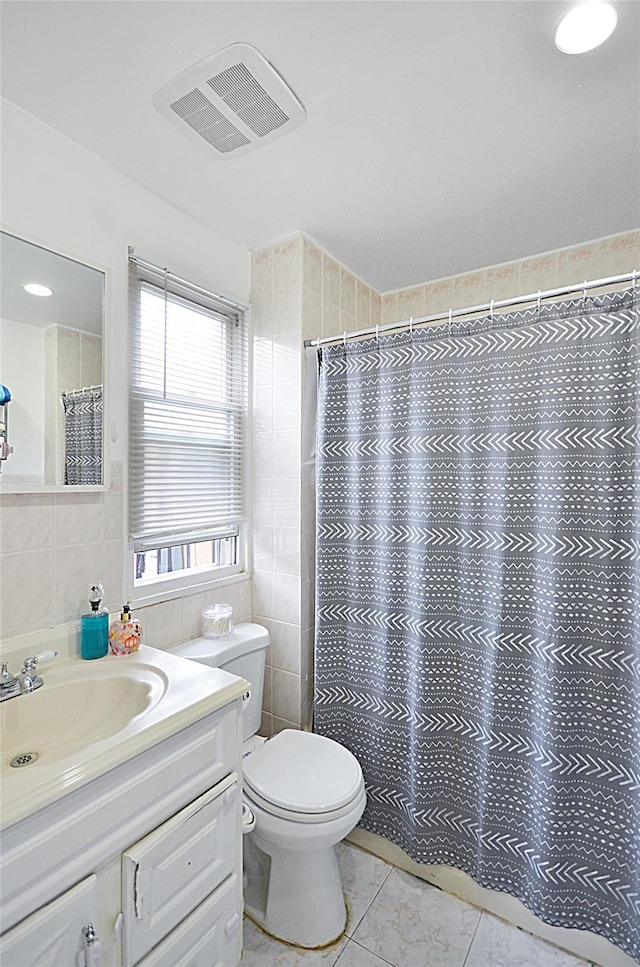 3070 Lasalle Ave, Bronx, NY 10461 - full bath with tile walls, tile patterned flooring, vanity, and a shower with shower curtain