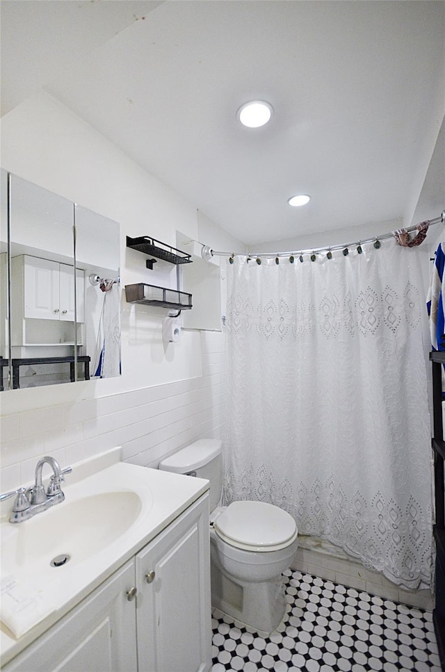 3070 Lasalle Ave, Bronx, NY 10461 - bathroom with vanity, recessed lighting, tile patterned flooring, a wainscoted wall, and a shower with curtain