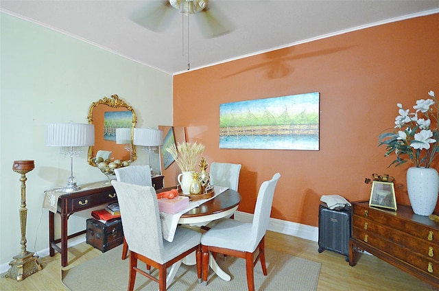 3070 Lasalle Ave, Bronx, NY 10461 - dining area featuring a ceiling fan, wood finished floors, and ornamental molding