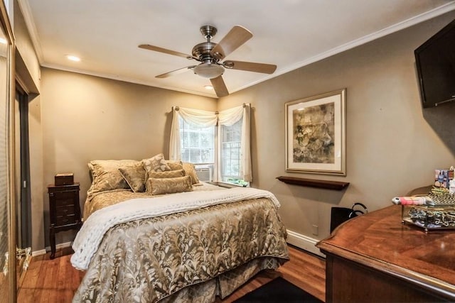 2209 Post St, East Meadow, NY 11554 - bedroom featuring wood finished floors, a baseboard heating unit, crown molding, recessed lighting, and a ceiling fan