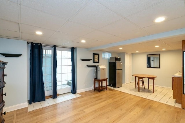 2209 Post St, East Meadow, NY 11554 - interior space featuring light wood-style floors, a paneled ceiling, and recessed lighting