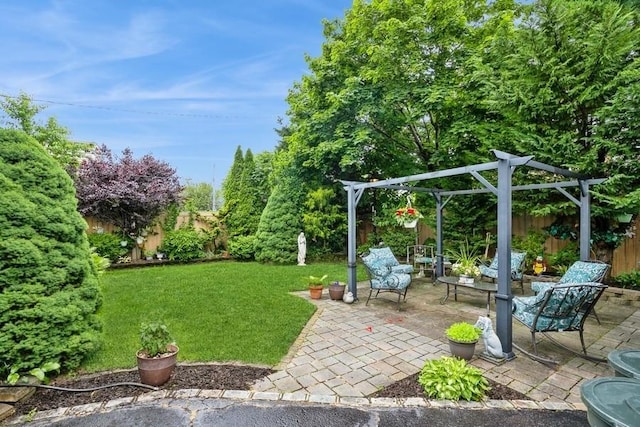 2209 Post St, East Meadow, NY 11554 - fenced backyard featuring a patio area and a pergola