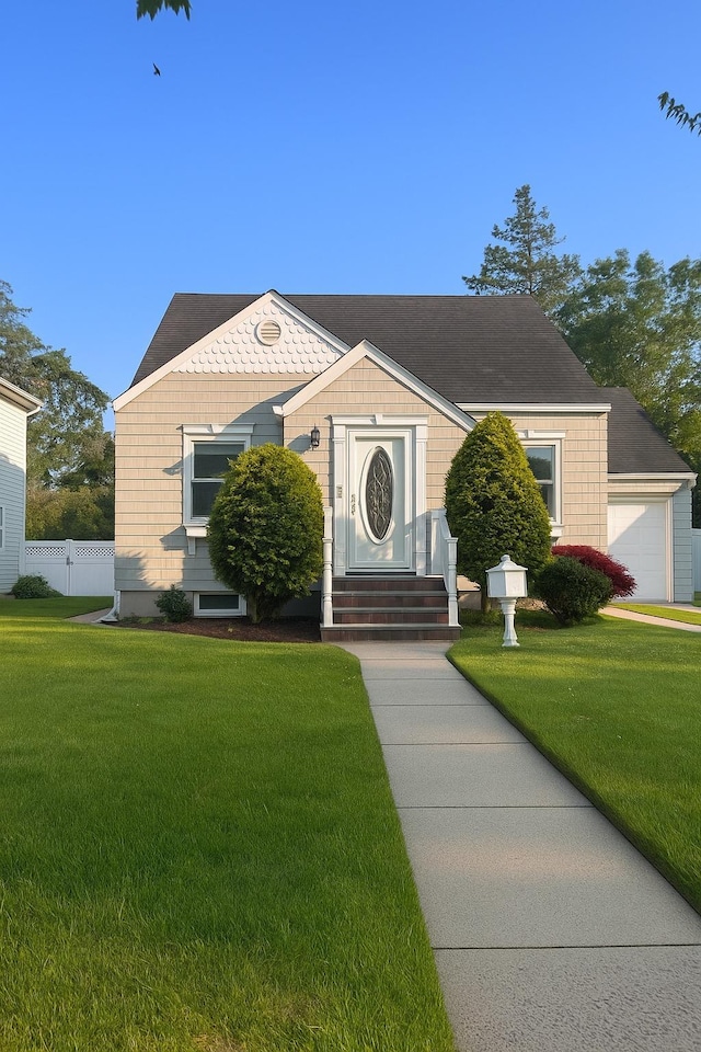 26 Sherman Rd, Farmingdale, NY 11735 - view of front of home with a garage