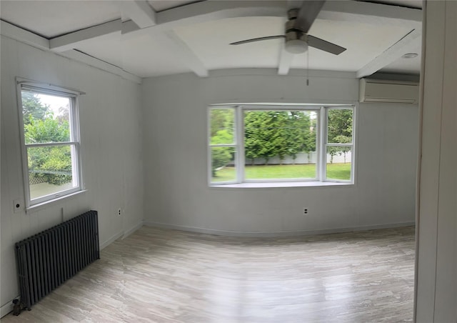 26 Sherman Rd, Farmingdale, NY 11735 - unfurnished room with radiator, an AC wall unit, light wood finished floors, a ceiling fan, and beamed ceiling
