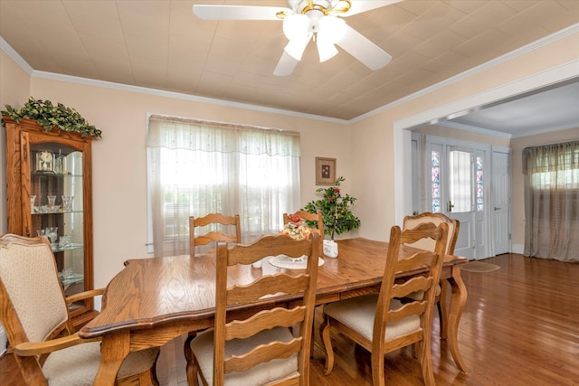 1277 Jerusalem Ave, Merrick, NY 11566 - dining space with wood finished floors, healthy amount of natural light, ornamental molding, and a ceiling fan
