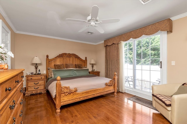 1277 Jerusalem Ave, Merrick, NY 11566 - bedroom featuring access to exterior, wood finished floors, ornamental molding, and a ceiling fan