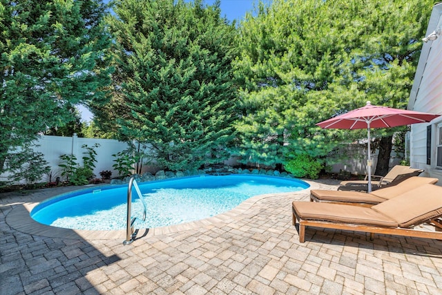 1277 Jerusalem Ave, Merrick, NY 11566 - view of swimming pool with a fenced backyard and a patio
