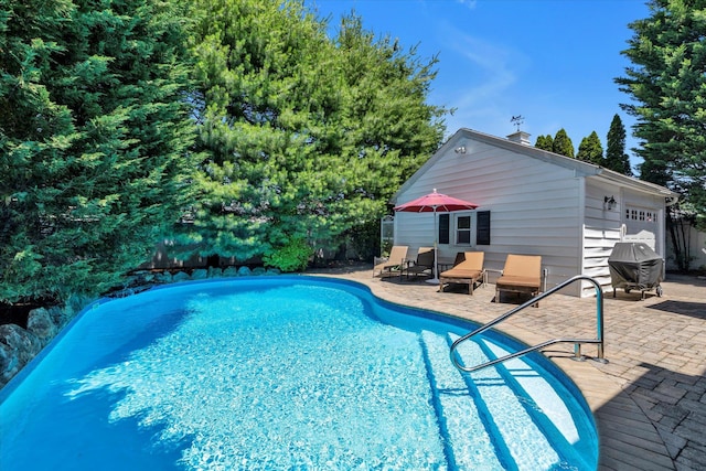 1277 Jerusalem Ave, Merrick, NY 11566 - outdoor pool with a patio and grilling area