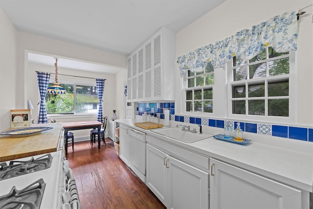 10 Wiltshire St, Bronxville, NY 10708 - kitchen with white appliances, dark wood-type flooring, decorative backsplash, wood counters, and white cabinetry