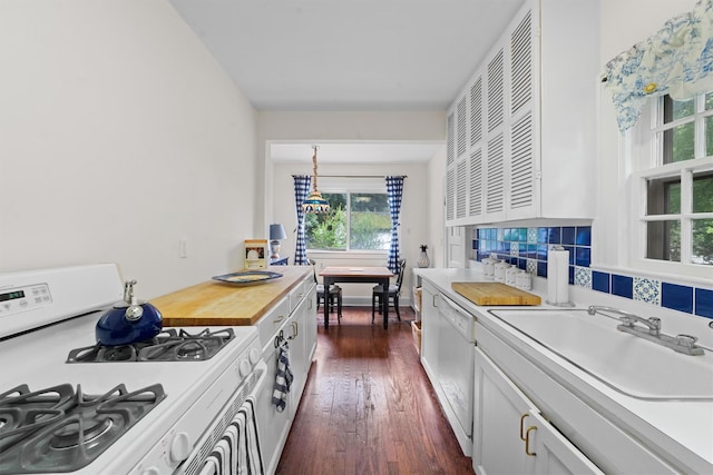10 Wiltshire St, Bronxville, NY 10708 - kitchen featuring white appliances, dark wood finished floors, and white cabinets