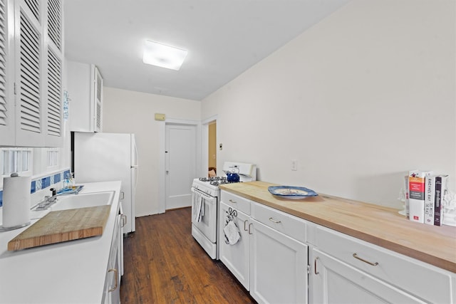 10 Wiltshire St, Bronxville, NY 10708 - kitchen with white appliances, wooden counters, dark wood finished floors, and white cabinetry
